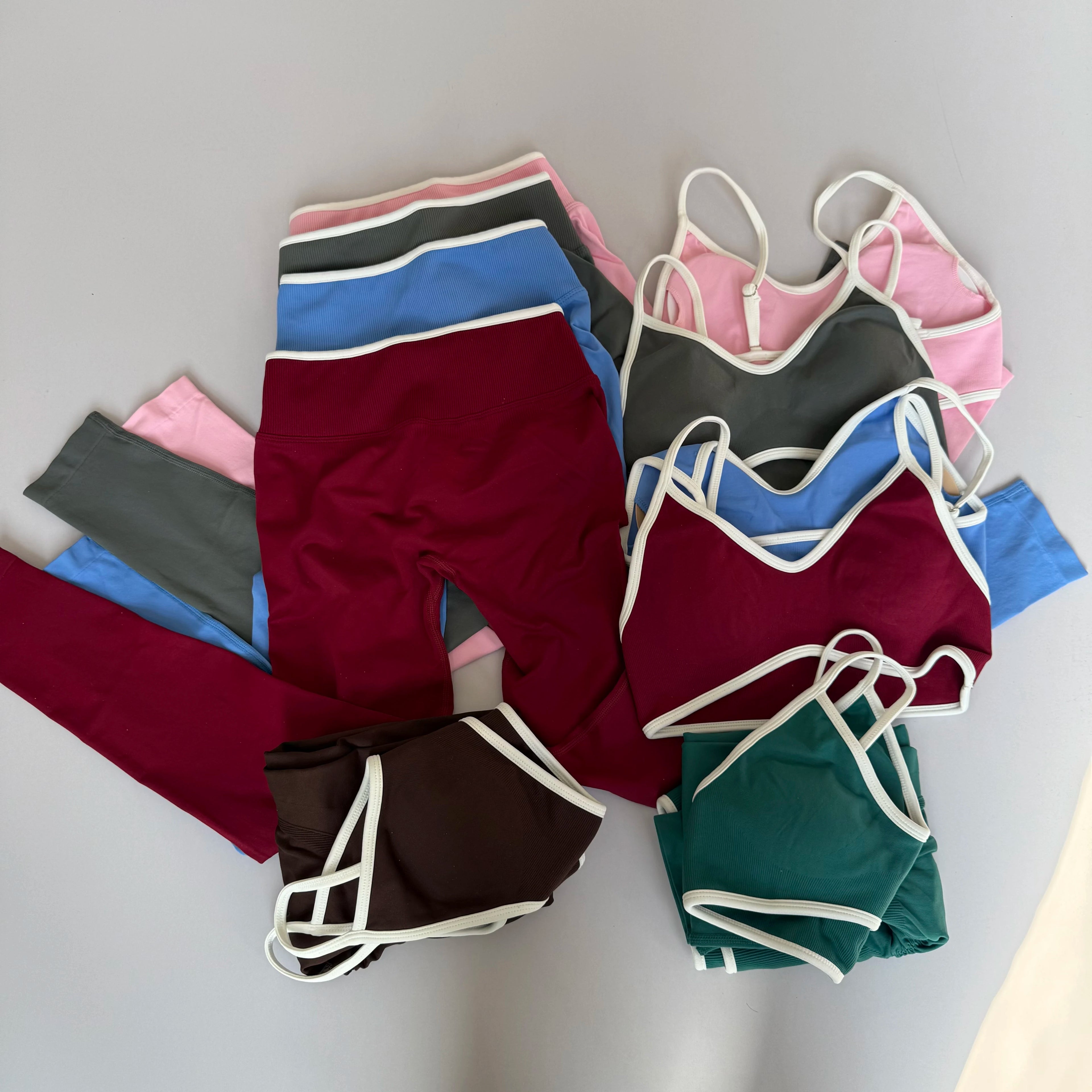 VYRENA Sisterhood Set - strappy sports bra and high-waist leggings, front view